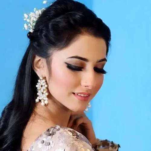 "Event glam makeup by Dolledup By Tooba, featuring bold eyes, radiant skin, and a glamorous, standout look for any occasion."